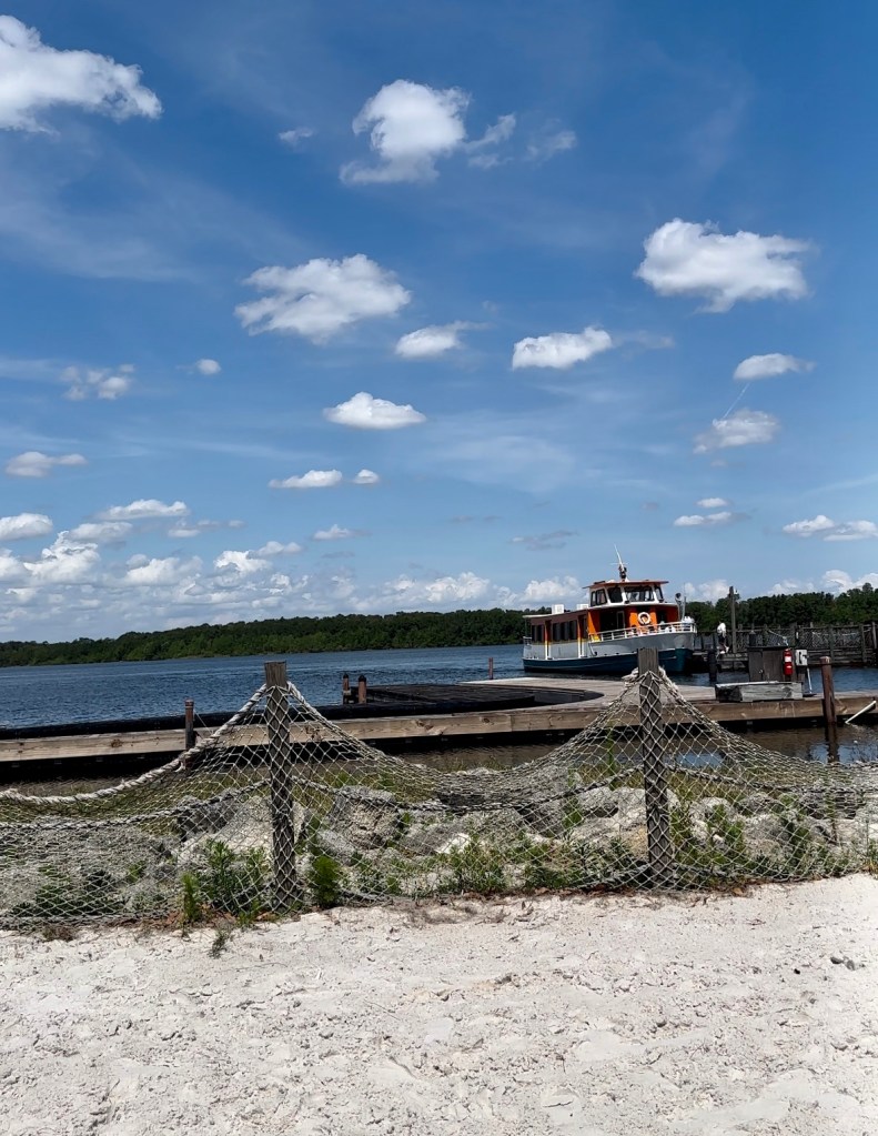 Boat coming into dock at the Campgrounds of Disney’s Fort Wilderness Resort