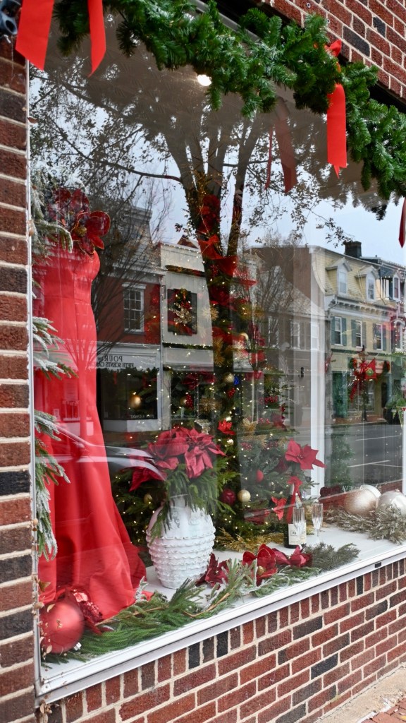 True bride in Fredericksburg, Virginia holiday window with red dress