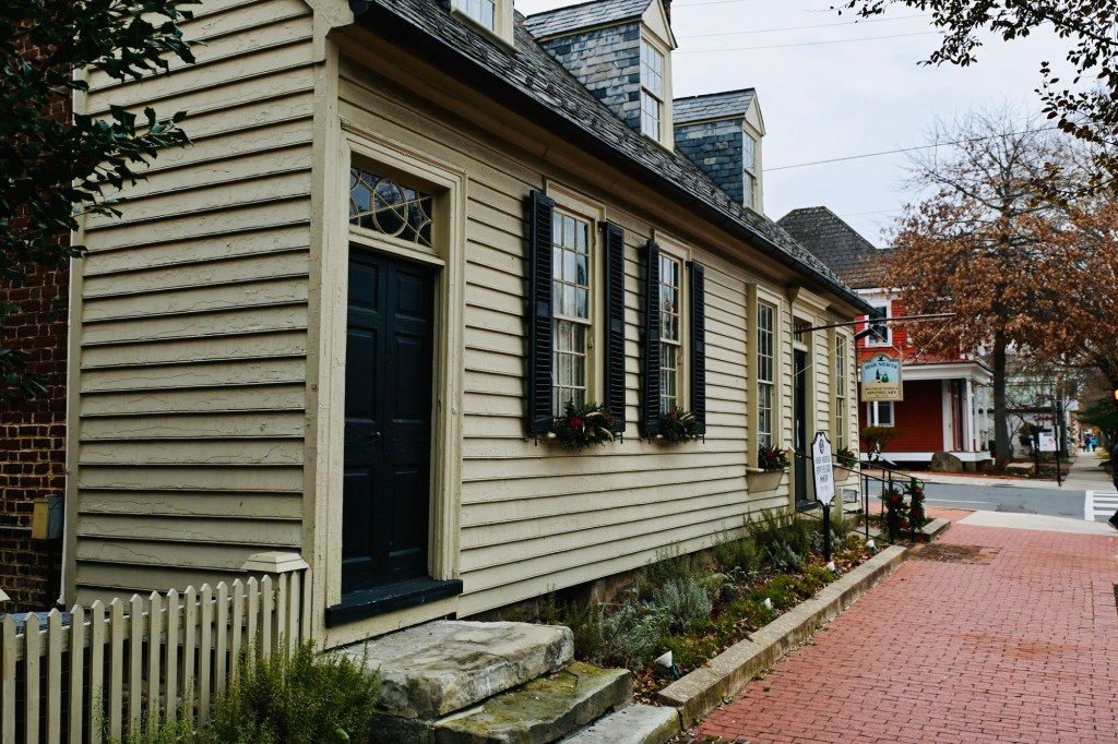 Colonial apothecary building in downtown Fredericksburg decorated for Christmas